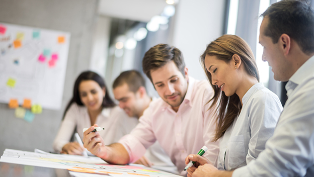 Young executives discussing figures