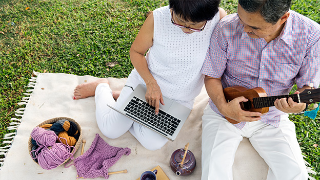 Senior citizens enjoying a picnic